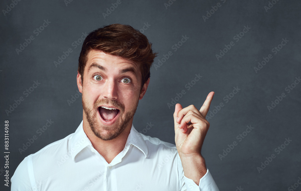 Portrait, surprise and man with idea, studio and wow with smile in mockup for bookkeeper and shirt. Grey background, professional and clothes for accountant, pointing or confidence of employee Portrait, surprise and man with idea, studio and wow with smile in mockup for bookkeeper and shirt. Grey background, professional and clothes for accountant, pointing or confidence of employee