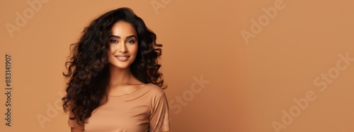 A beautiful latina woman standing against a beige background with empty copy space for text and advertising, ai generated