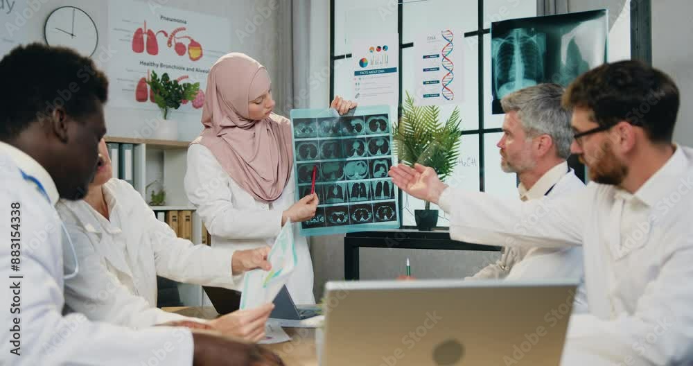 Man and woman team of doctors having joint meeting in clinic office. Medicine and healthcare concept. Man and woman team of doctors having joint meeting in clinic office. Medicine and healthcare concept.