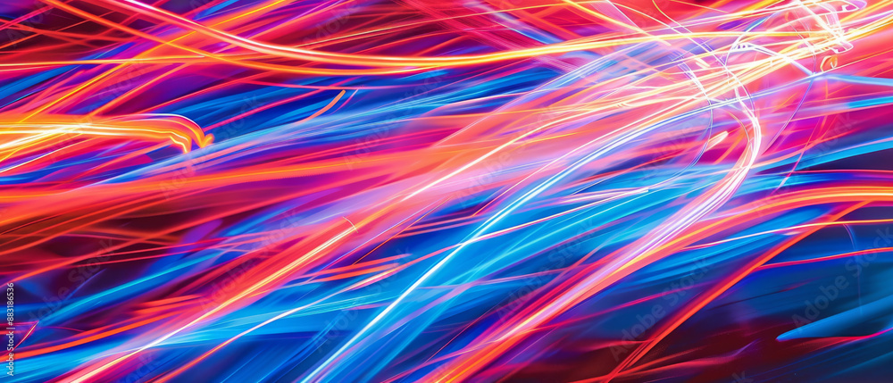 Spiraling lights in vivid blues, pinks, and reds, capturing the essence of motion and energy. Spiraling lights in vivid blues, pinks, and reds, capturing the essence of motion and energy.