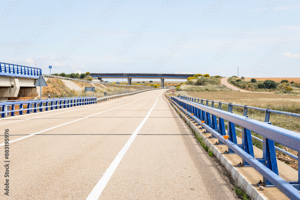 N-630 paved road at Embalse de Ricobayo near San Cebrian de Castro, province of Zamora, Castile and Leon, Spain N-630 paved road at Embalse de Ricobayo near San Cebrian de Castro, province of Zamora, Castile and Leon, Spain