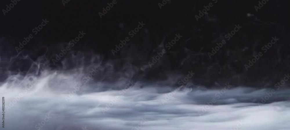 Wisps of white smoke on a black background Wisps of white smoke on a black background