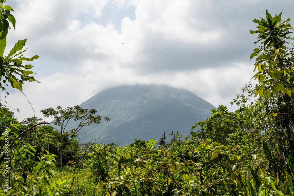 Obraz premium View of the Arenal volcano from Bogarin Trail, a nature trail in the town of La Fortuna, Costa Rica, Central America