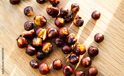roasted peas on wooden background