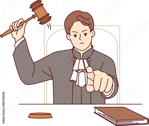 Φωτογραφία Stern judge pronounces verdict and points finger at screen after hitting gavel and announcing prison term