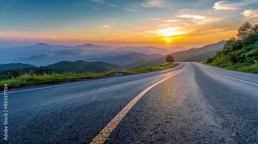 Asphalt highway road with mountain scenery at sunrise, panoramic view. Asphalt highway road with mountain scenery at sunrise, panoramic view.