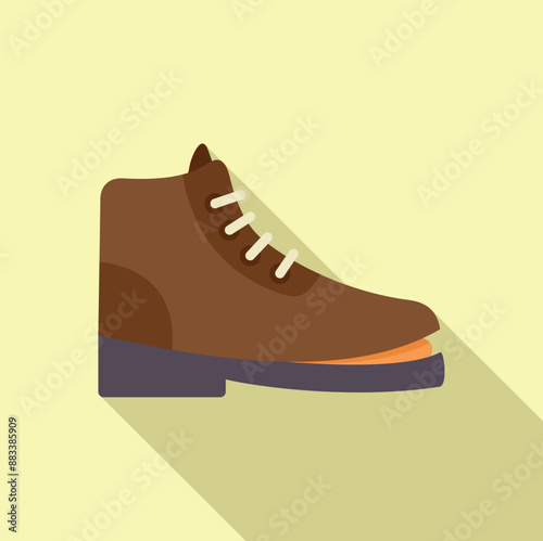 Brown leather boot is standing on one foot, casting a long shadow