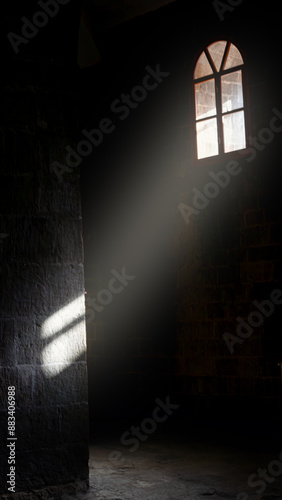 Islamic background image with a vertical layout and empty space for text, featuring light streaming through a window, creating a peaceful and reflective atmosphere.