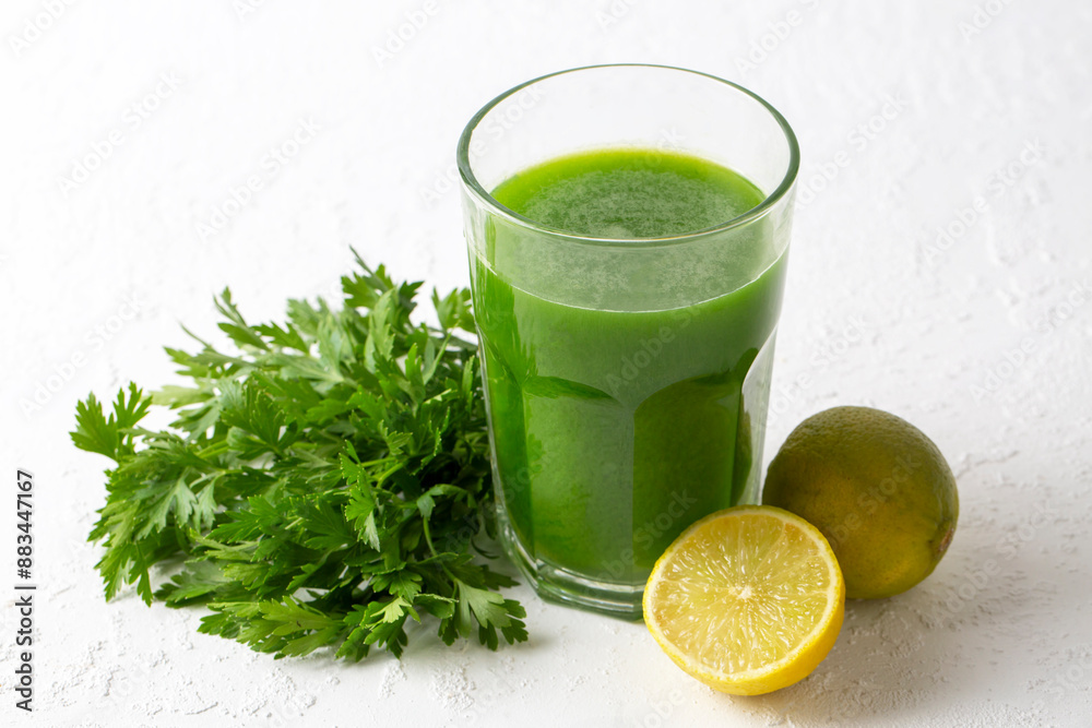 Green healthy detox, lemon and parsley juice. Green vegetable smoothie