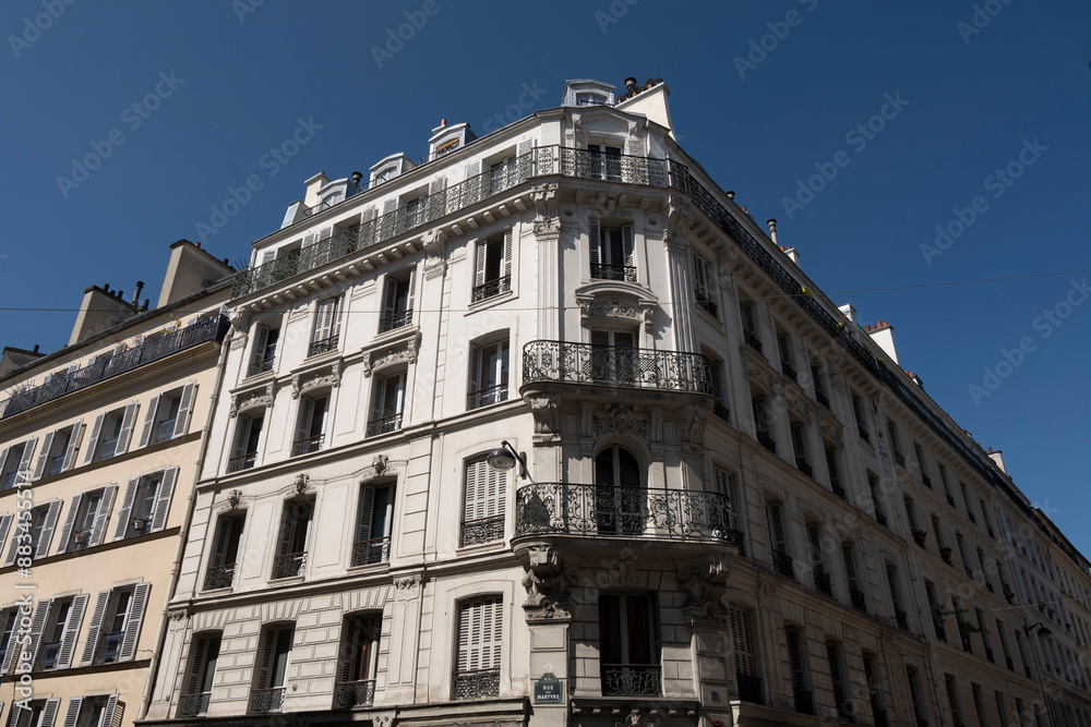 Fototapeta premium view of the city of light during the day on a blue sky day with its typical architecture
