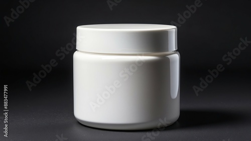 Plain white cosmetic jar against a black background, ideal for beauty or skincare branding