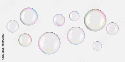 Soap bubbles float 3D on white background. Glossy translucent rainbow-colored spheres flare in air. Light glowing bath foam, carbonated frothy fizz drinks, and magic ball luxury glass effect.