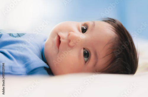 cute baby on a white sheet