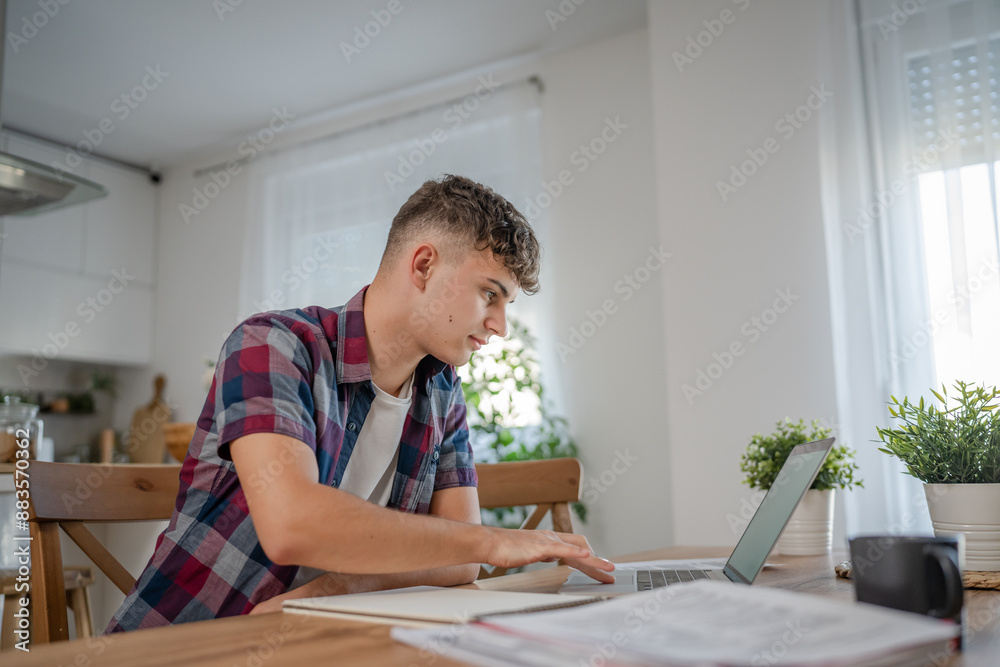 Young caucasian man teenager student study at home Young caucasian man teenager student study at home