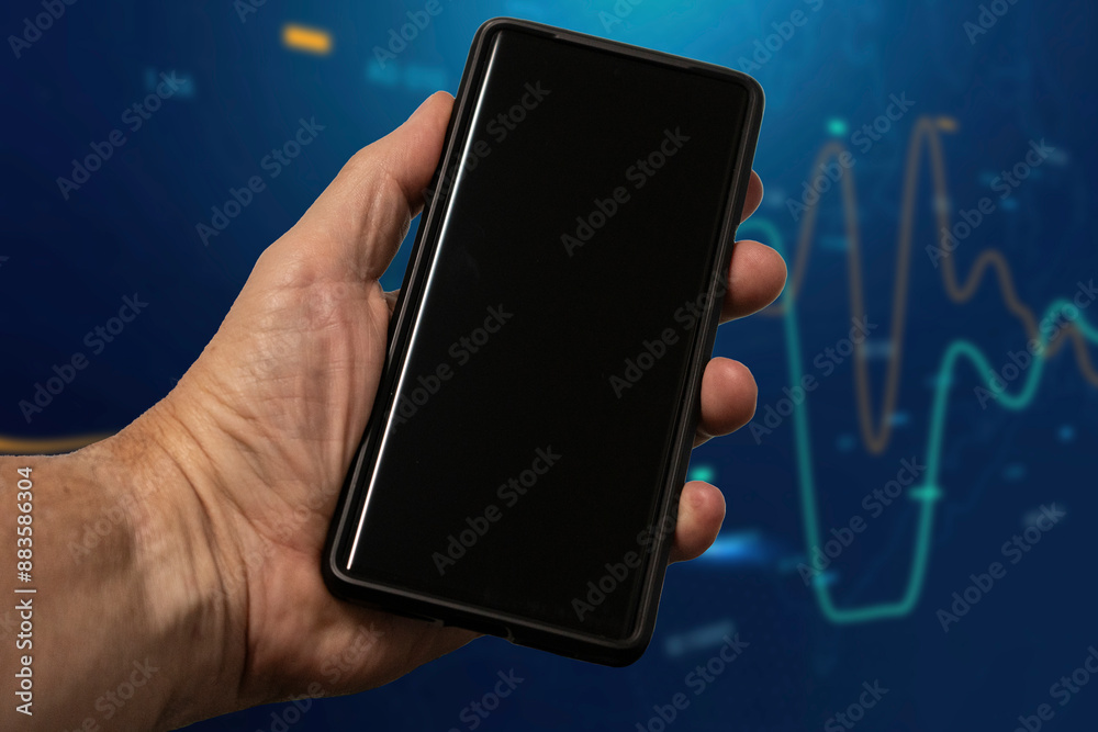 Mans hand holding cell phone with blank screen Mans hand holding cell phone with blank screen