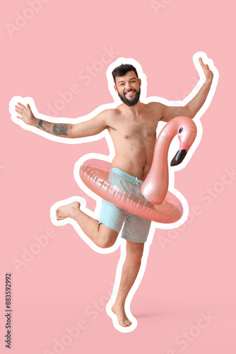 Funny young man with inflat...