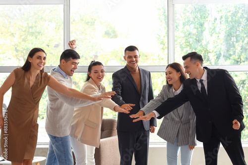 Group of business people pu...