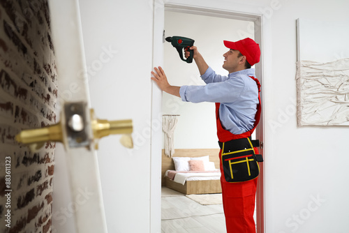 Male worker with electric d...