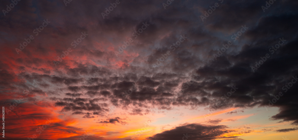 Sunset clouds are gathering. Panoramic sunrise or sunset sky with clouds. Sunset Sky on Twilight in the Evening with Sunset. Cloud Nature Sky Backgrounds. Sky Sunrise, Dusk clouds. Sunset clouds are gathering. Panoramic sunrise or sunset sky with clouds. Sunset Sky on Twilight in the Evening with Sunset. Cloud Nature Sky Backgrounds. Sky Sunrise, Dusk clouds.