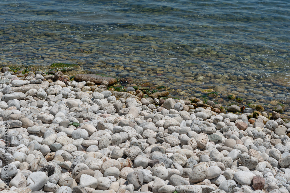 rocks at the edge of the lake rocks at the edge of the lake