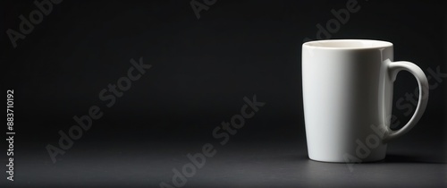 White ceramic mug on a dark background, perfect for coffee or tea Ideal for minimalist designs