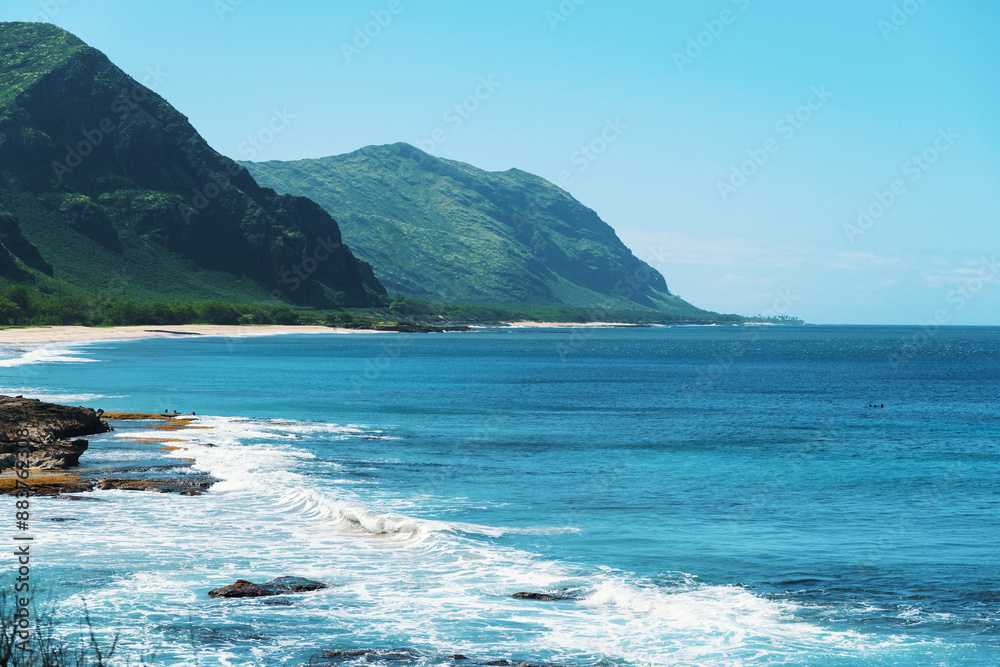 Water with mountains in the distance, creating a picturesque landscape