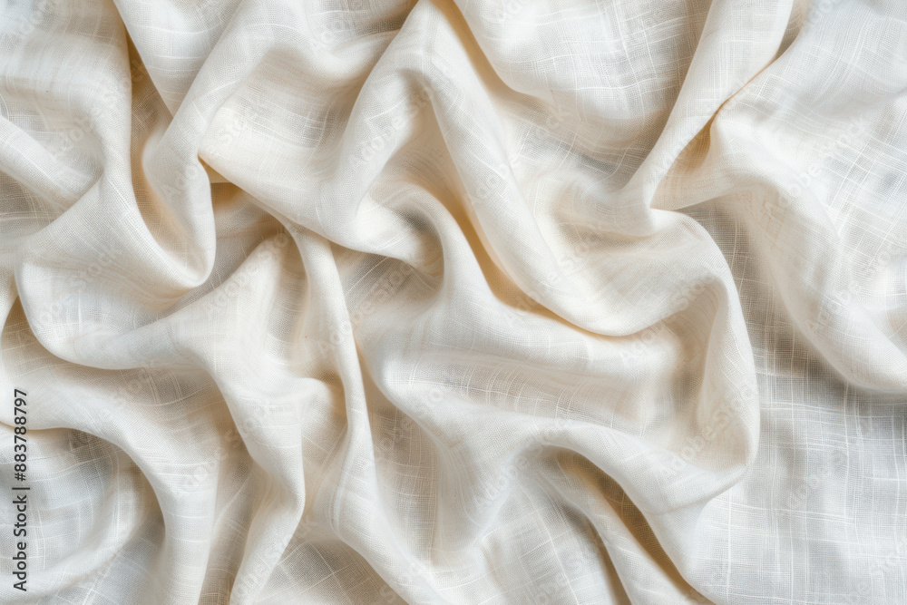 Obraz premium Close-up of crumpled white fabric with a subtle texture and natural folds creating abstract patterns, perfect for background and textile design projects.