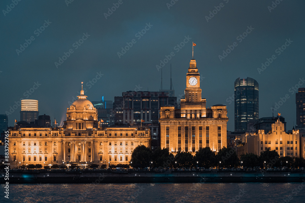Obraz premium Urban skyscrapers in Shanghai at night;