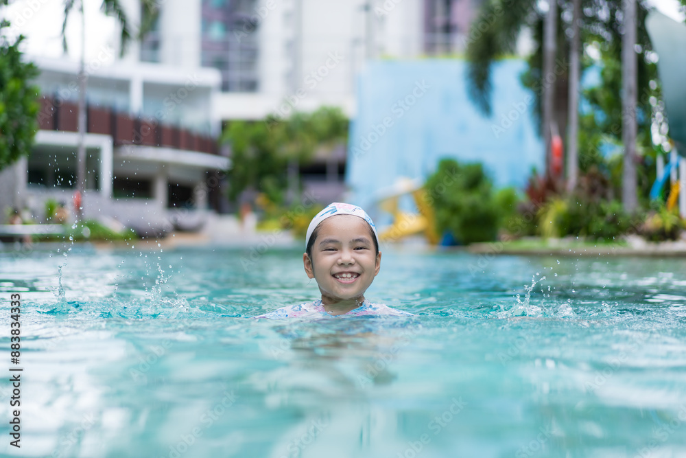 Φωτογραφία summer by Asian child happy smile in swimming pool or kid girl wear swimsuit and