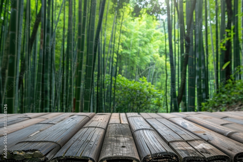 background view of a bamboo forest with a bamboo wooden table in front, can be used for product presentations background view of a bamboo forest with a bamboo wooden table in front, can be used for product presentations