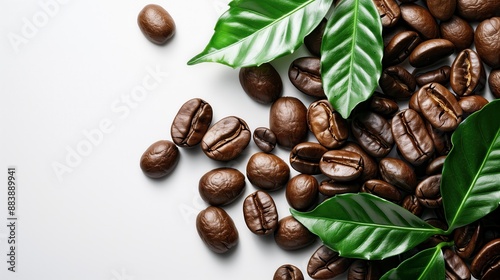 Freshly Roasted Brown Coffee Beans with Vibrant Green Leaves on a Pristine Background