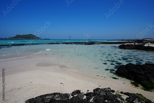 fascinating shoaling beach with far island photo