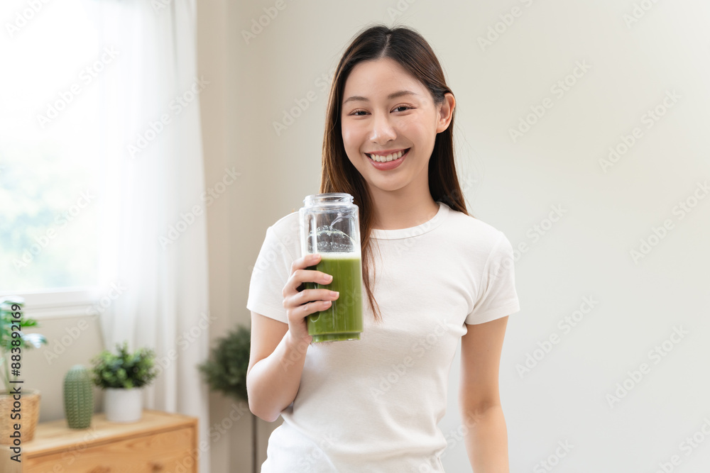 young woman drinking detox drink made by vegetable and fruit mixed. young woman drinking detox drink made by vegetable and fruit mixed.