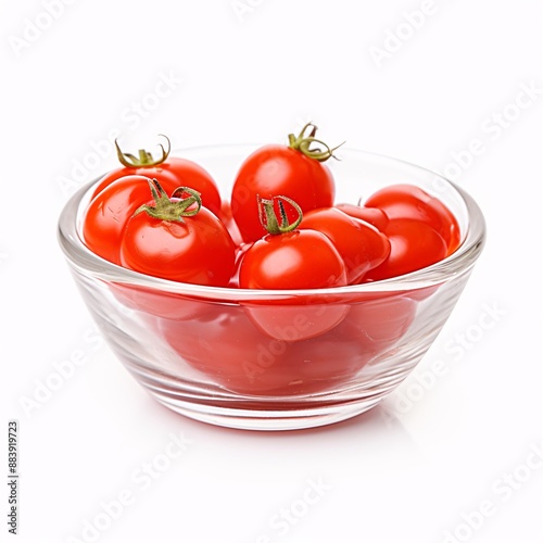 Small glass condiment bowl of red tomato sauce ketchup. Isolated on white in perspective.