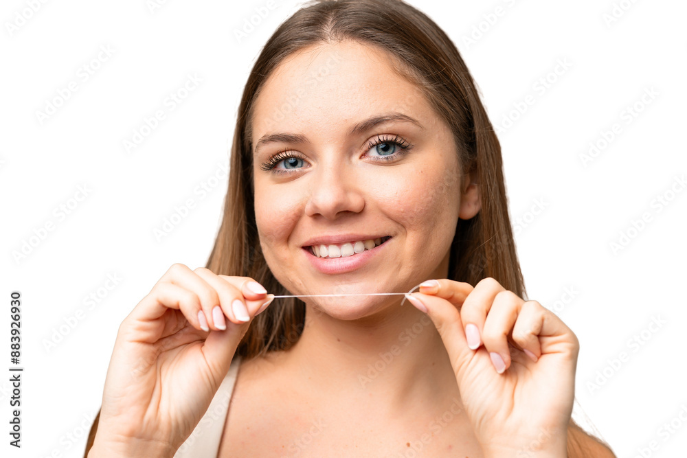 Young blonde woman over isolated chroma key background with dental floss. Close up portrait Young blonde woman over isolated chroma key background with dental floss. Close up portrait