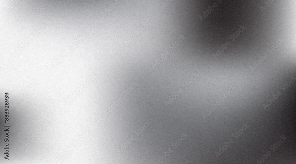 Abstract monochrome background with noisy grainy gradient going from black to white Abstract monochrome background with noisy grainy gradient going from black to white