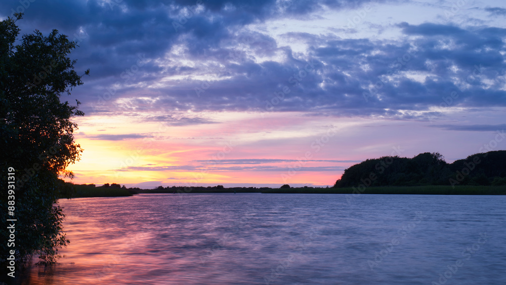 stunning sunset landscape scenery, beautiful dramatic skies over Corrib river at Galway, Ireland, nature background