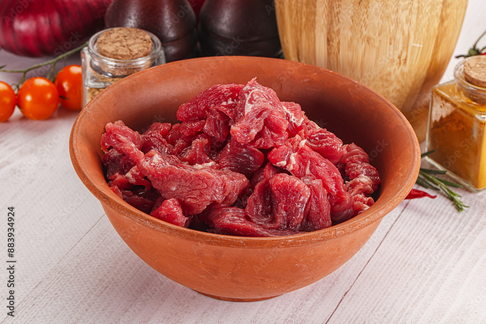 Raw beef meat - sliced strips Raw beef meat - sliced strips