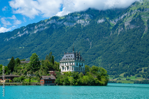 Idyllic view of the Iseltwald village by lake Brienz in summer, Canton Bern in Switzerland