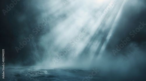 Stunning light beams piercing through foggy air, creating a dramatic and ethereal effect.