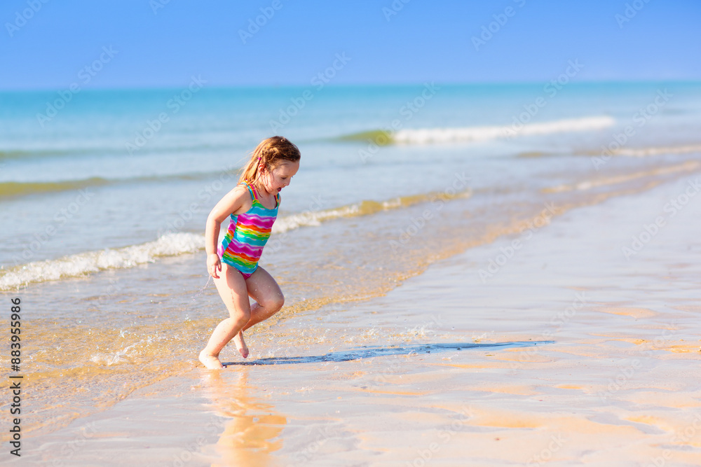 Kids playing on beach. Children play at sea. Kids playing on beach. Children play at sea.