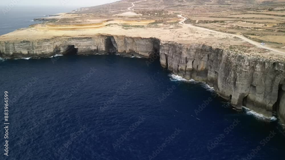Aerial video over the island of Gozo, beautiful Malta cliffs from above Aerial video over the island of Gozo, beautiful Malta cliffs from above