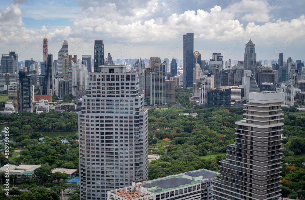 Bangkok's Cityscape with skyline buildings and Lumpini Park, Thailand