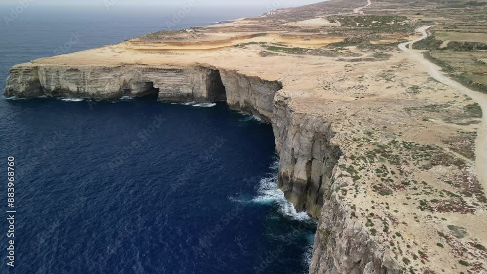 Aerial video over the island of Gozo, beautiful Malta cliffs from above Aerial video over the island of Gozo, beautiful Malta cliffs from above