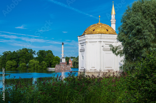 Turkish bath and Chesme Column in Catherine Park with reflection in the wate, Tsarskoe Selo, Pushkin, St. Petersburg, Russia. photo