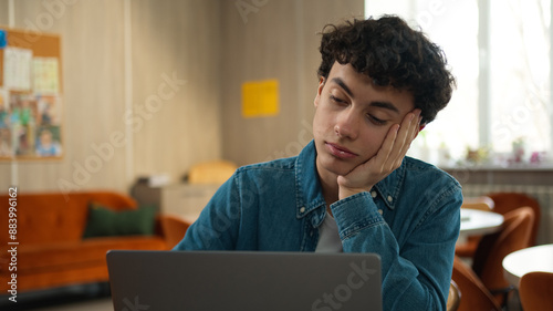 Fotografie Caucasian tired bored sad upset fatigued man male student guy boy schoolboy pupi