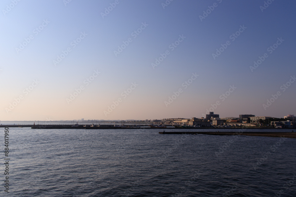 Serene Sunset Over the Waters of Enoshima, Japan Serene Sunset Over the Waters of Enoshima, Japan