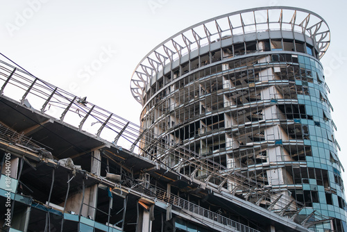 Destroyed business center after ballistic missile attack, Kyiv, Ukraine. Broken windows on building facade after explosion. Russian aggression in Ukraine. War in Ukraine. Damage after missile attack