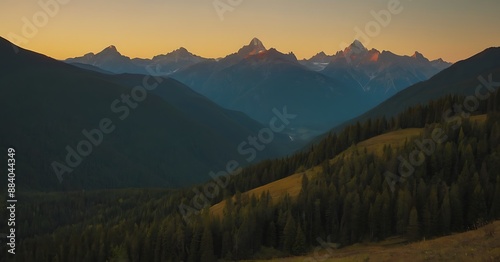 The sun rising over a majestic mountain range, casting golden hues across the peaks and valleys.