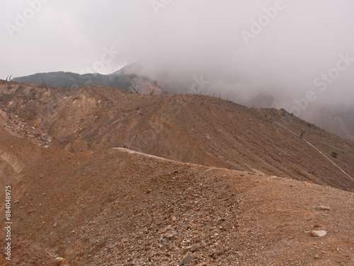 A mountain covered in dirt and rocks